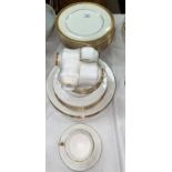 A set of 12 Minton "Buckingham" dinner plates; a Royal Knight bone china part tea set with gilt