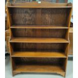 An early 20th century stained ash 4 height church bookcase with hinged top shelf, PAT. APL, 92cm
