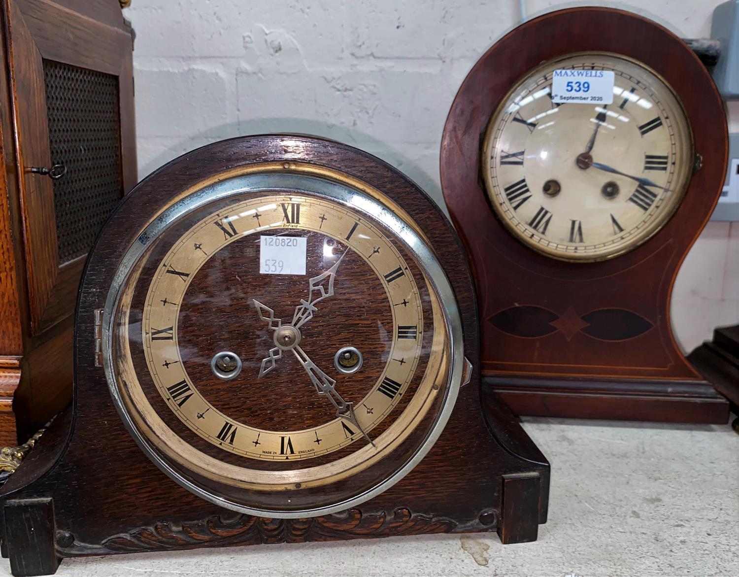 An Edwardian striking mantel clock in mahogany balloon top case; a 1930's striking mantel clock; a