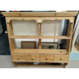 A Victorian style pine delft rack with 2 shelves and 4 drawers