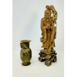 A Chinese brown soapstone figure of a sage with staff and gourd, height 35 cm; a Chinese mottled