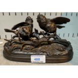 J Moigniez: a bronze group depicting 2 fighting birds, impressed signature