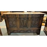 18th century framed and panelled oak mule chest with later carved decorated hinged lid, base and