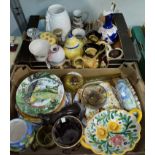 A large selection of decorative plates and pottery