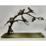 A 1930's cold painted bronze group - Five budgerigars on a branch, on onyx plinth