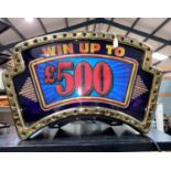 A 1960's style 'upcycled' illuminated One Arm Bandit top display lettered 'Win Up To £500'