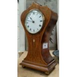 An Edwardian inlaid mahogany balloon top mantel clock with French drum movement