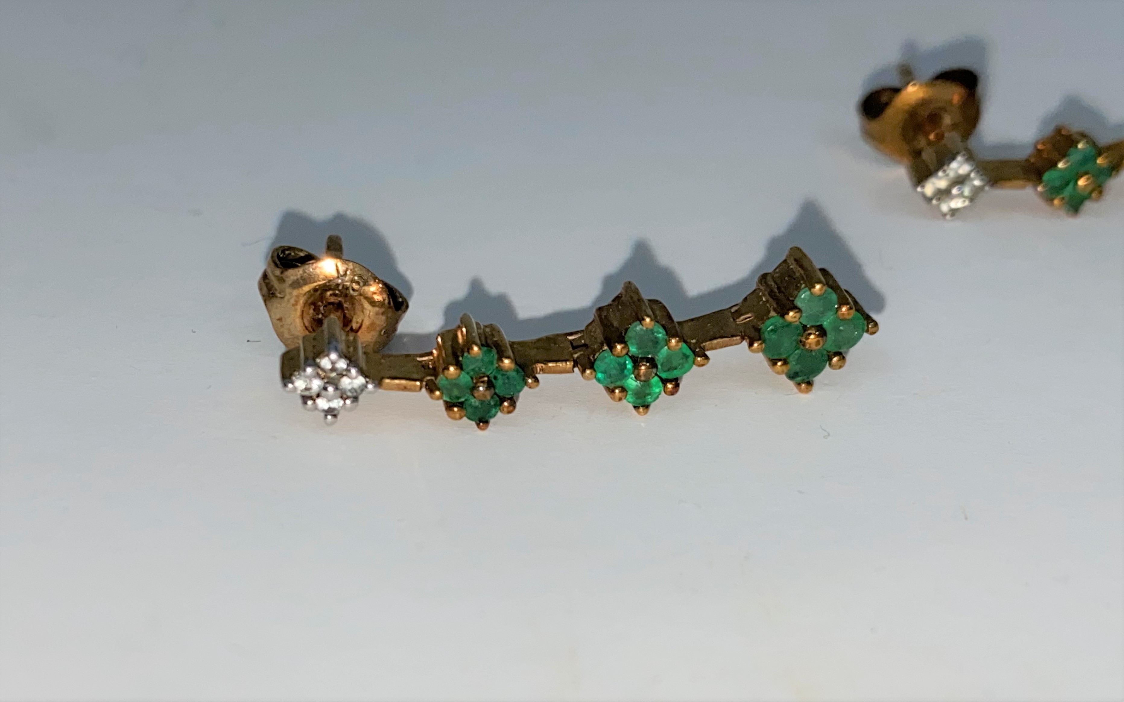 A pair of 9 carat hallmarked gold earrings, each set 4 small diamonds and 12 Emeralds 2.7 gms - Image 3 of 3