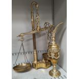 A classical style decorative brass ewer and a pair of reproduction brass scales and weights