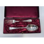 A cased monogrammed hallmarked silver table spoon and fork, London 1899, 3.5oz