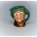 A miniature Royal Doulton character jug - Arriet