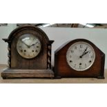 An oak cased Mantle Clock with barley twist columns & another similar mantle clock.