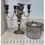 A silver plated candelabra: a glass and silver plated biscuit barrel (handle af)