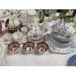 A Shelley 14 piece part coffee set decorated with bunches of flowers; a Paragon coffee sets of 6