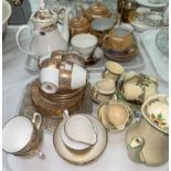 A 1930's 15 piece coffee set by Wedgewood & Co.; a Gladstone 21 piece tea set; a Berkshire 15