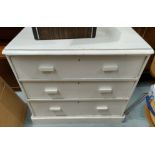 A white painted chest of drawers