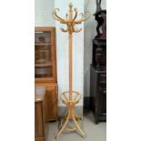 A modern bentwood hat and coat stand