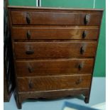 An Oak five height chest of drawers