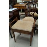 A pair of mahogany dining chairs with shield backs; an Edwardian pair of dining chairs; a piano