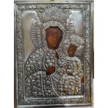 A early to mid 20th century Polish painted icon with white metal surround featuring Mary