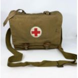 A vintage medical field bag with some original Eastern European packed bandages etc