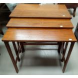 A France & Son Danish teak nest of three plain rectangular tables. 60cm, 57cm & 54cm.