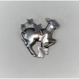 Georg Jensen: a silver brooch designed by Arno Malinowski, gambolling lamb with ivy overlay, stamped