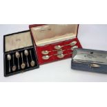 Two sets of 6 hallmarked silver coffee spoons, cased, London 1951 & Sheffield 1975, 3.5 oz; a silver