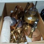 A brass oil lamp; a brass companion set; copper pans; etc.