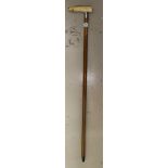 An ivory handled and silver collared walking cane.