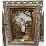 Robert William Bates; Lady on a pathway picking flowers, cottage nearby, oil on board, signed,