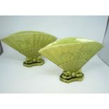 A pair of green glazed 'Burmantofts Faience' fan vases, width 32cm (one hairline cracks)