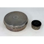 A hallmarked silver circular box, engine turned, with plastic lining, Birmingham 1948; a