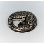 A Georg Jensen Danish silver oval brooch of stylized leaf and brooch design, stamped Georg Jensen in