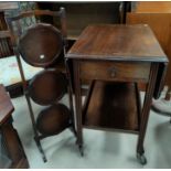A 2 tier tea trolley with drop leaf; a folding 3 height cake stand; a walnut hall table