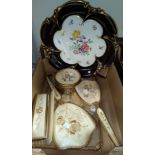 A 4-piece gilt dressing table set; a Dresden style porcelain shallow dish; a mahogany fitted canteen