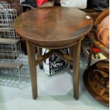 A copper top pub table with circular top