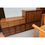A 1960's Nathan teak 2 piece wall unit comprising side cabinet with cupboard under and low unit of 4