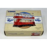 A Corgi Classic Commercials diecast closed top red London Transport tram advertising 'News of the