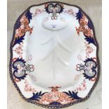 A large 19th Century Royal Crown Derby Imari Kings pattern meat platter with juice well, length 49cm