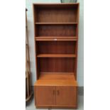A 1960's G-Plan teak full height bookcase with double cupboard