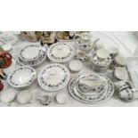 A Royal Doulton "Burgundy" dinner, tea and coffee service