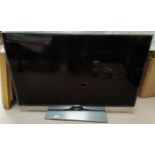 A Samsung 40" flat screen TV with accessories