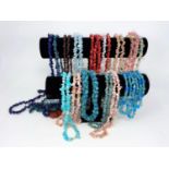 A large selection of necklaces and bracelets, in natural stone; etc.