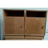 A pair of 1950's pale oak bedside cabinets 46 cm