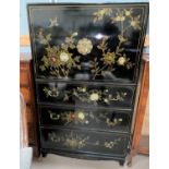 A 20th century black lacquer Chinese style side cabinet with cupboard above and 3 drawers below