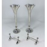 A pair of hallmarked silver specimen vases with folded and serrated rims, London 1904; a pair of