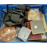 A selection of collectors items: a pair of Tasco binoculars; a bridge set; playing cards; cutlery;