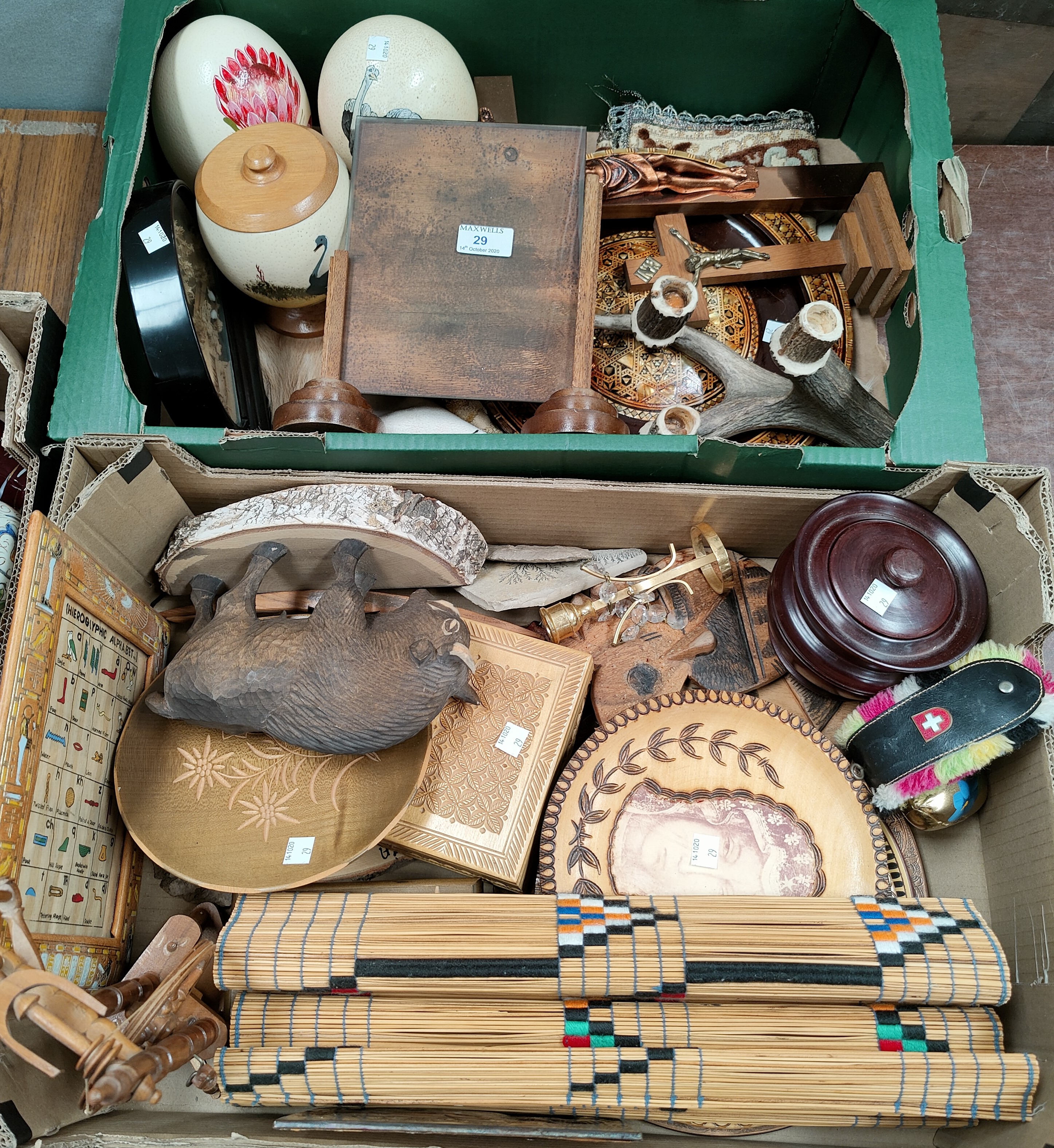 A selection of treen and decorative items: 3 painted ostrich eggs; musical boxes; plaques; animal