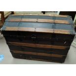 A late Victorian wood and metal bound domed top trunk with interior fitting 76cm